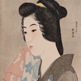 手ぬぐい持てる女